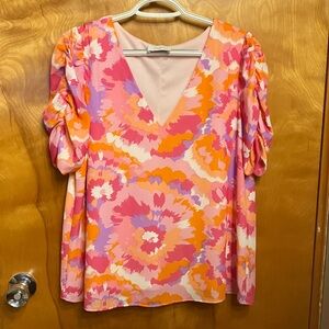 ADRIENNE. Pink Orange Floral V-Neck Puff Sleeve Blouse. Has a Lining. Size M.